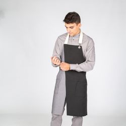 Tablier à bavette avec ouverture noir/gris